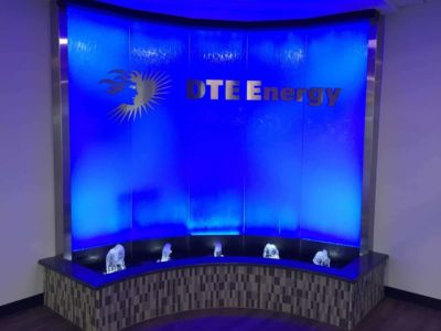 Curved Glass Water Wall with Stainless Frame and Reflection Pool with Bubble Jets for DTE Energy in Ann Arbor Michigan