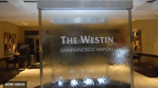 Custom-Glass-Water-Walls-at-Westin-Hotel-at-San-Francicso-Airport-Water-Walls-with-Etched-Logo