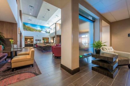 Glass and Stainless Water Wall at Hampton Inn Suites Tempe Arizona
