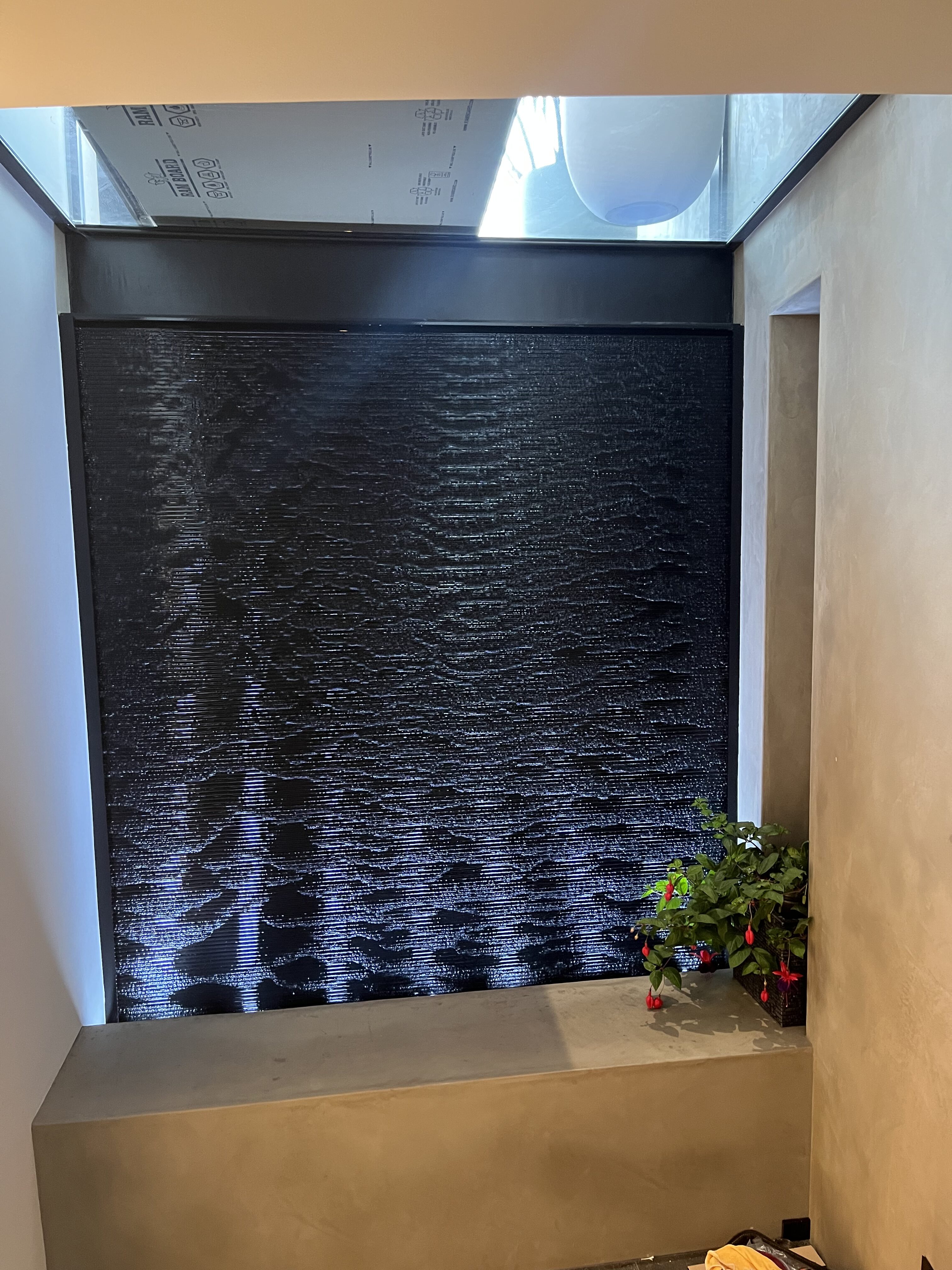 Black Scored Acrylic Water Wall for Home Residence in Santa Barbara, California