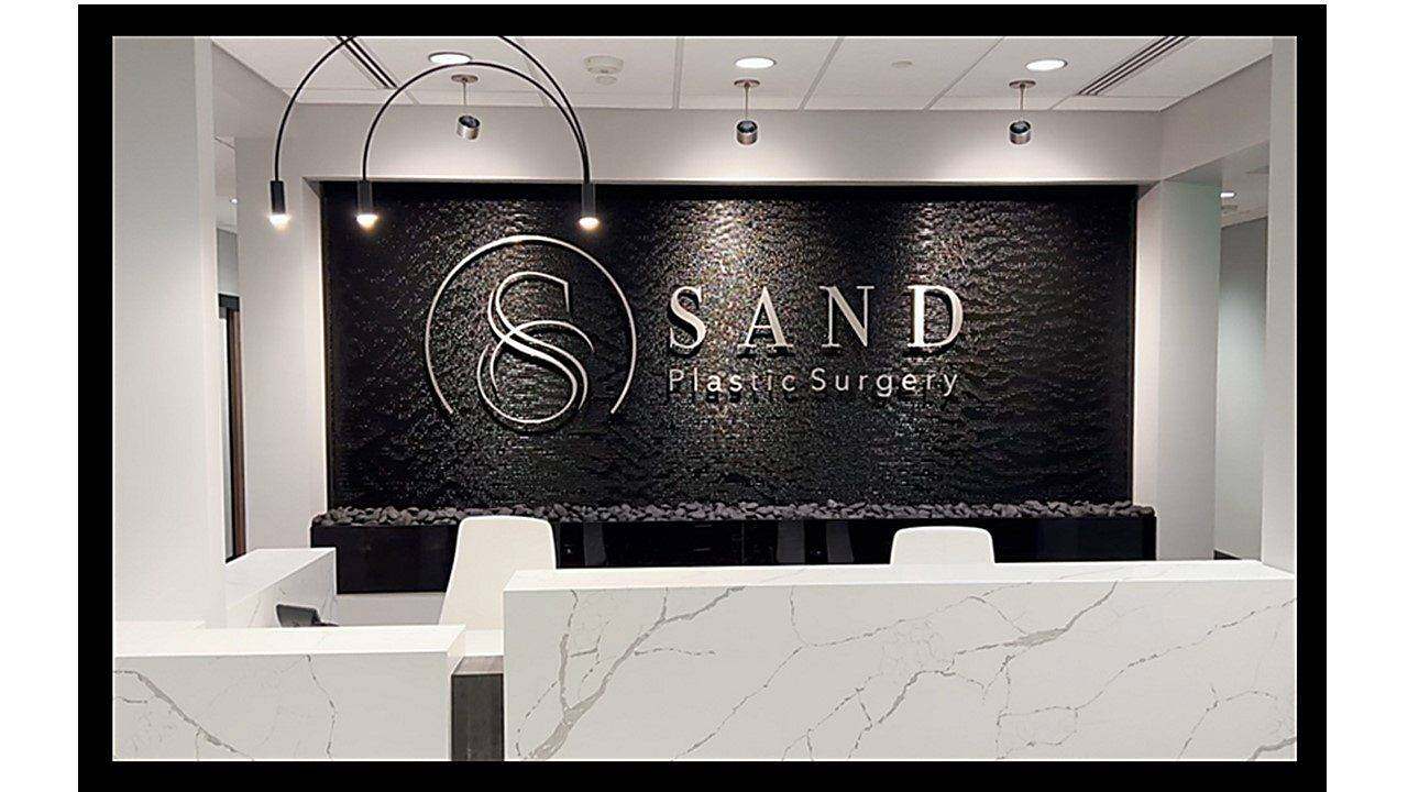 Black Scored Acrylic Water Wall for Sands Plastic Surgery in Spokane Washington