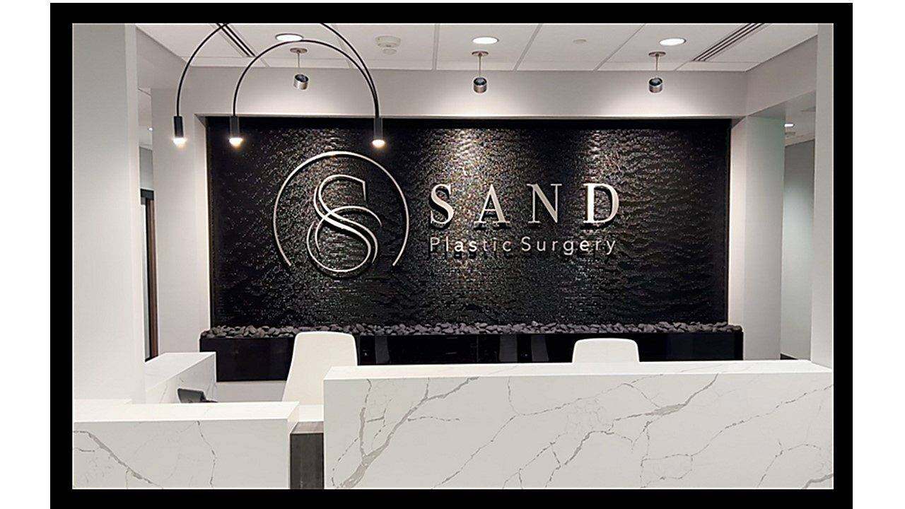 Black Scored Acrylic Water Wall for Sands Plastic Surgery in Spokane, Washington