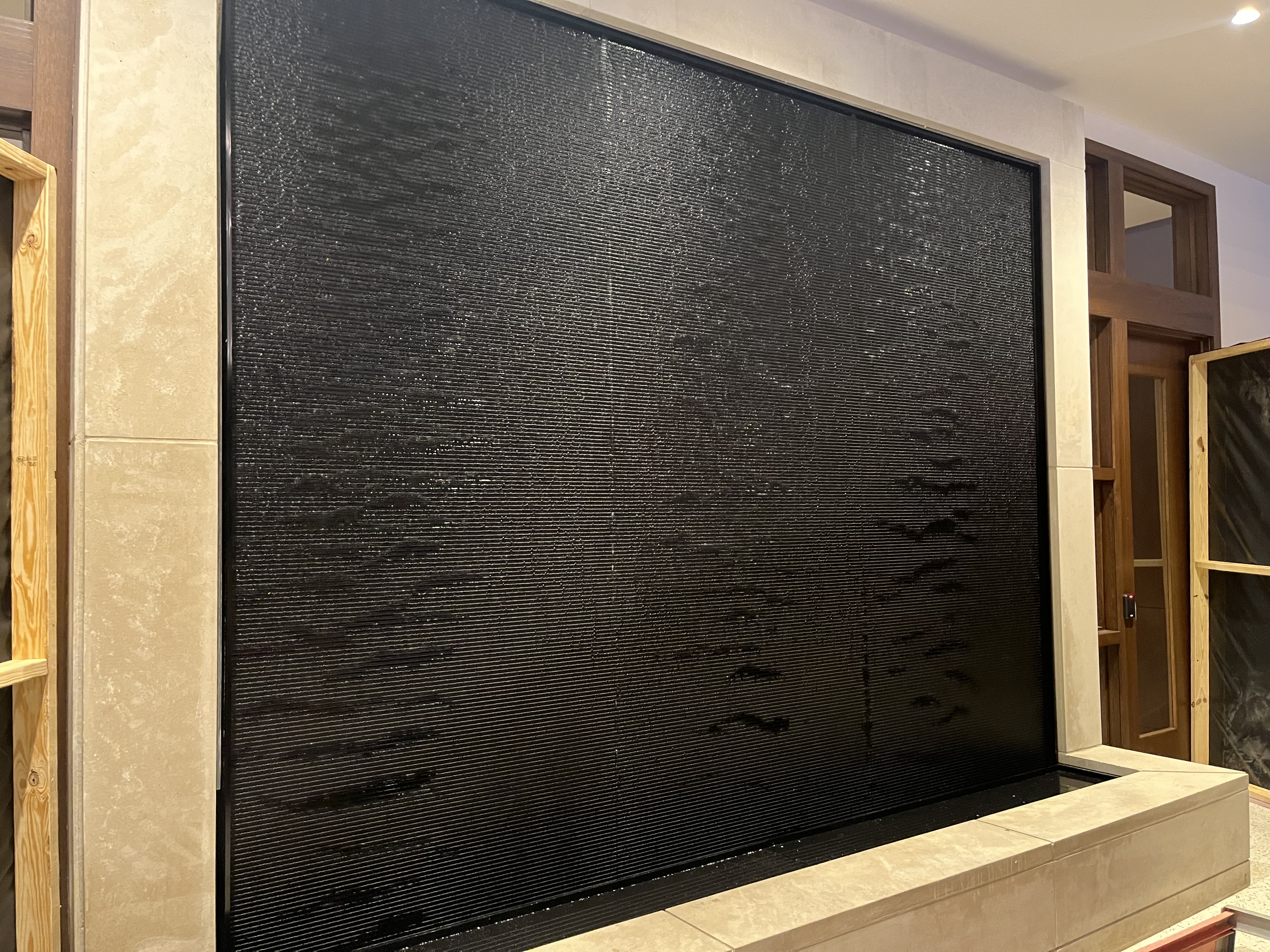 Black Scored Acrylic Water Wall with Reflection Pool For Montgomery Bell Academy in Nashville, Tennessee