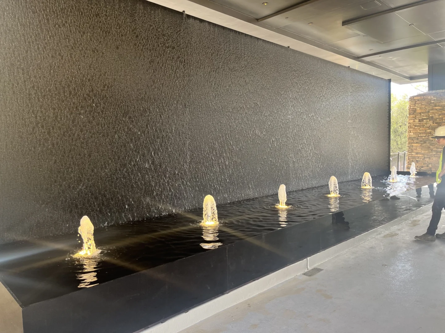 Black Scored Acrylic Water Wall with Reflection Pool and Bubbler Jets at Black Oak Casino Seven Sisters Restaurant in Tuolumne, California_1