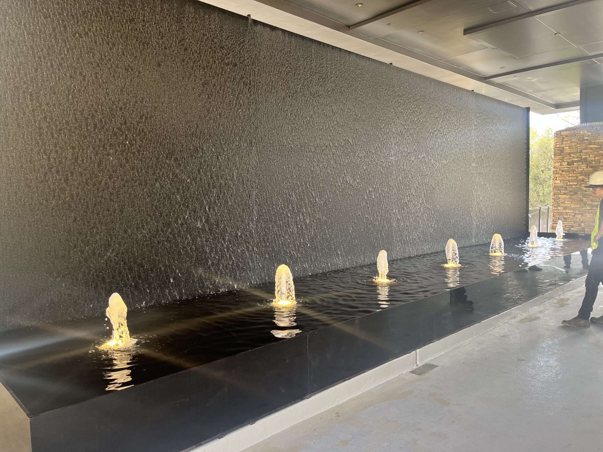 Black Scored Acrylic Water Wall with Reflection Pool and Bubbler Jets at Black Oak Casino Seven Sisters Restaurant in Tuolumne, California_1