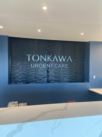 Black Scored Acrylic Water Wall with Tonkawa Northern Oklahoma Urgent Care in Tulsa Oklahaoma