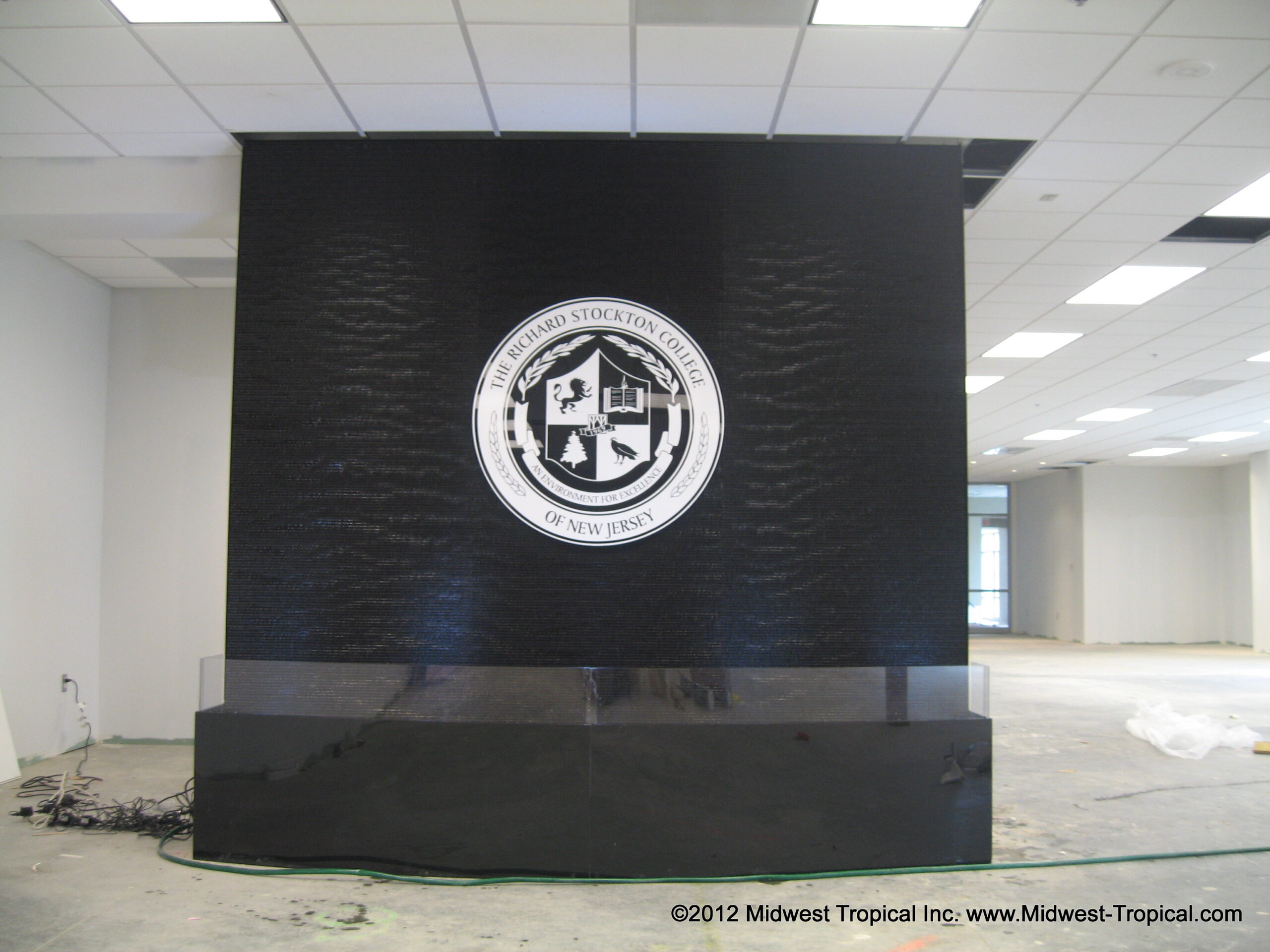 Black Scored with plaque logo scaled