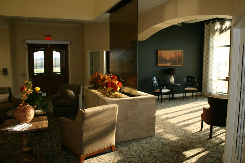 Bronze Glass Waterfall Live Oak Senior Care in Montgomery Houston Area Texas frameless glass water wall in lobby