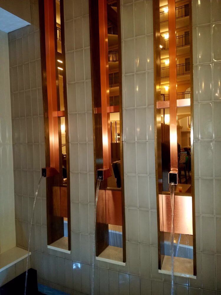 Copper Souts and weirs with reflection pool at Embassy Suites Milpitas