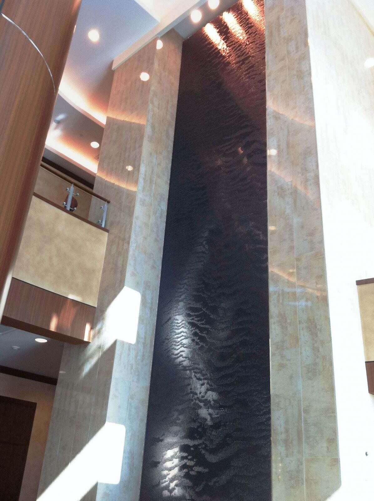 Embassy Suites Houston TX black scored acrylic water wall