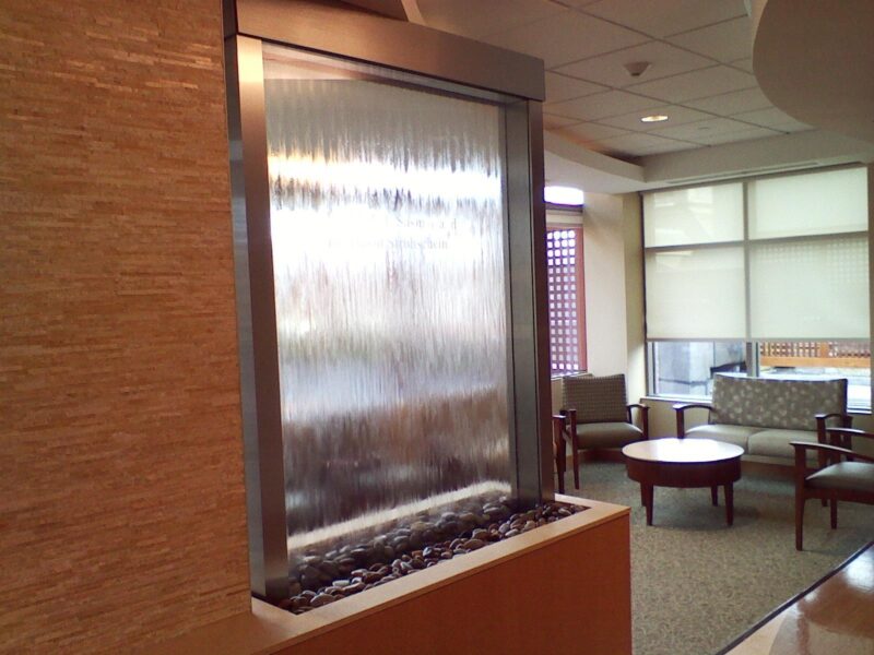 Enclosed glass waterfall Enclosed glass waterfall