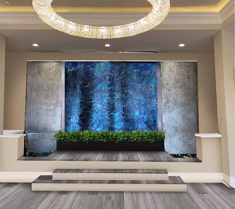 Frameless Glass Waterfall with Deep Blue Background