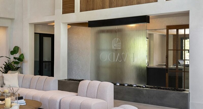 Glass Water Wall-Frameless-at Evado at Nexton Multi-Family Apartment Community in Summerville, South Carolina Glass Water Wall-Frameless-at Evado at Nexton Multi-Family Apartment Community in Summerville, South Carolina