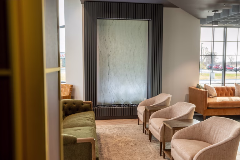 Glass Water Wall-Frameless- with stone slab tile behind at Medical Arts Dental in Sartell, Minnesota Glass Water Wall-Frameless- with stone slab tile behind at Medical Arts Dental in Sartell, Minnesota