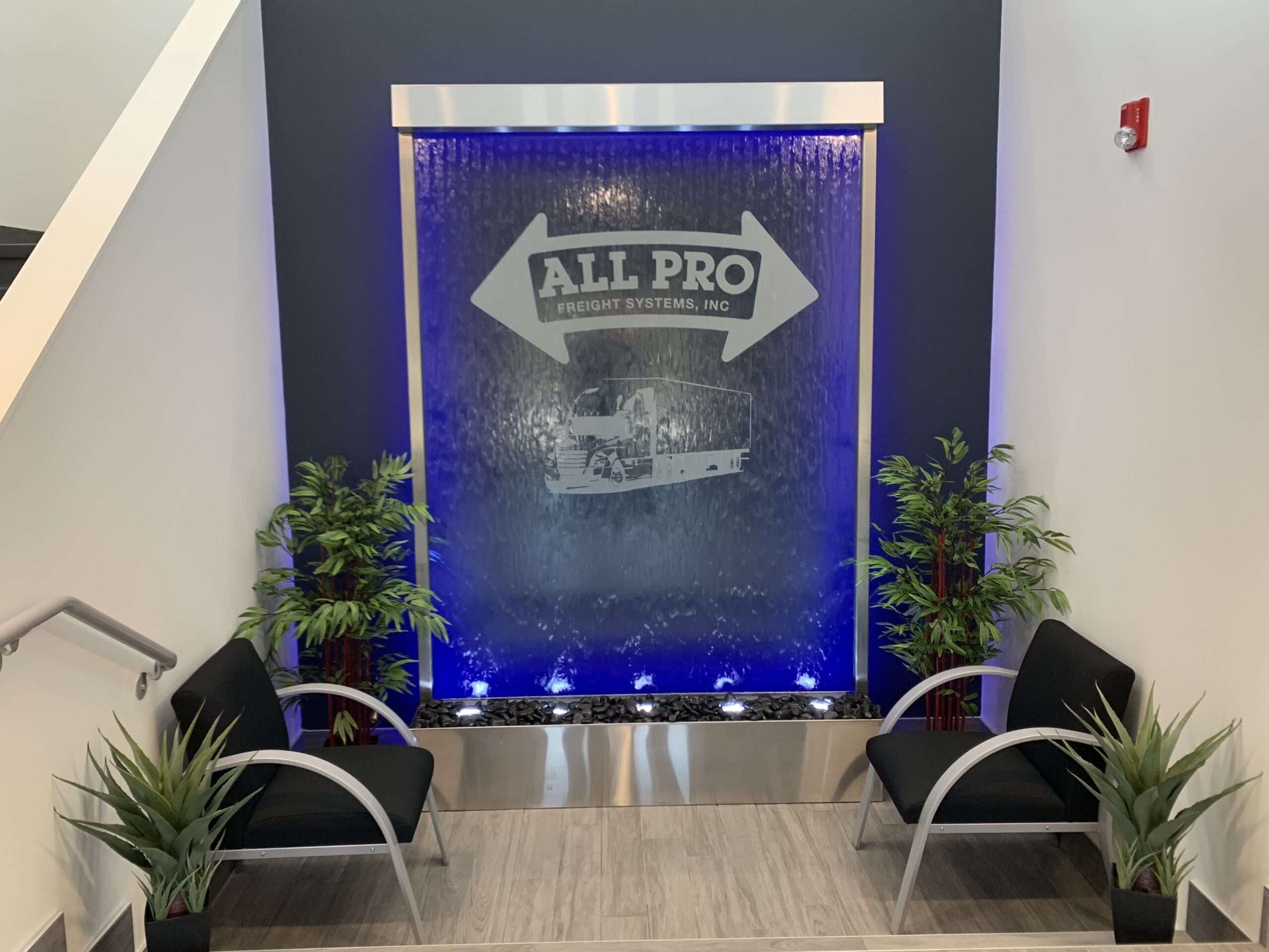 Glass Water Wall with Stainless Steel Frame and Etched Vinyl Logo scaled