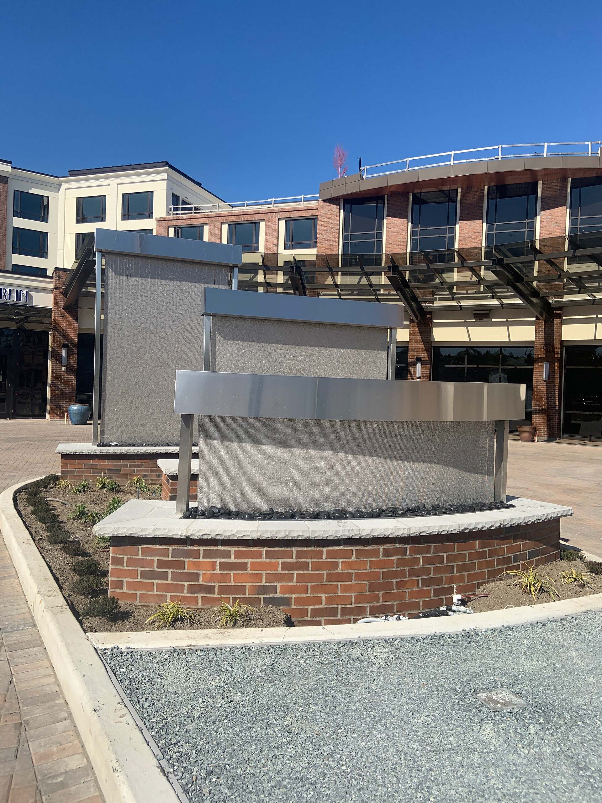 Mesh Outdoor Waterfall Water Walls at Silver Cloud Hotel Tacoma at Point Ruston Waterfront in Tacoma Washington rotated 1