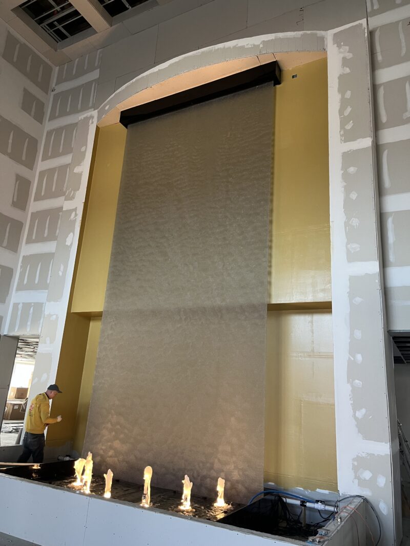 Mesh Water Wall with Reflection Pool and Bubbler Jets for Tesla Biohealing in New Castle, Delaware