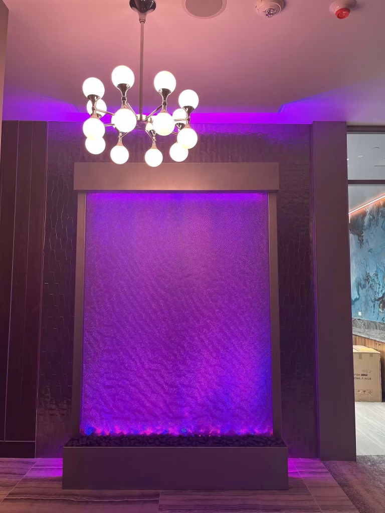 Mesh Waterwall With Powedercoated Painted Frame for SPa At Silver Cloud hotel in Tacoma, Washington Mesh Waterwall With Powedercoated Painted Frame for SPa At Silver Cloud hotel in Tacoma, Washington