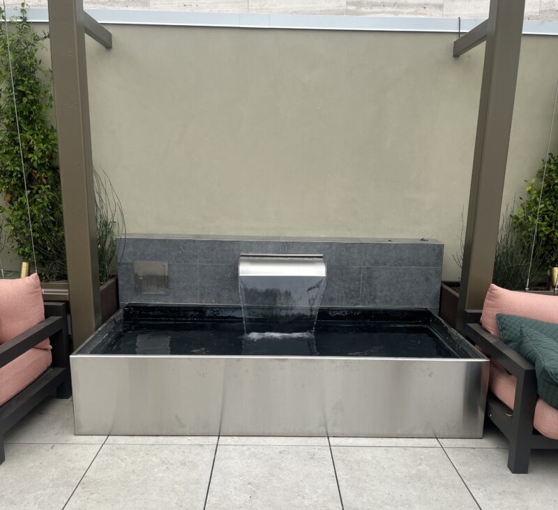 Outdoor Stainless Steel Reflection Pool with Overflowing Weir for AC Hotel in Pasadena, California