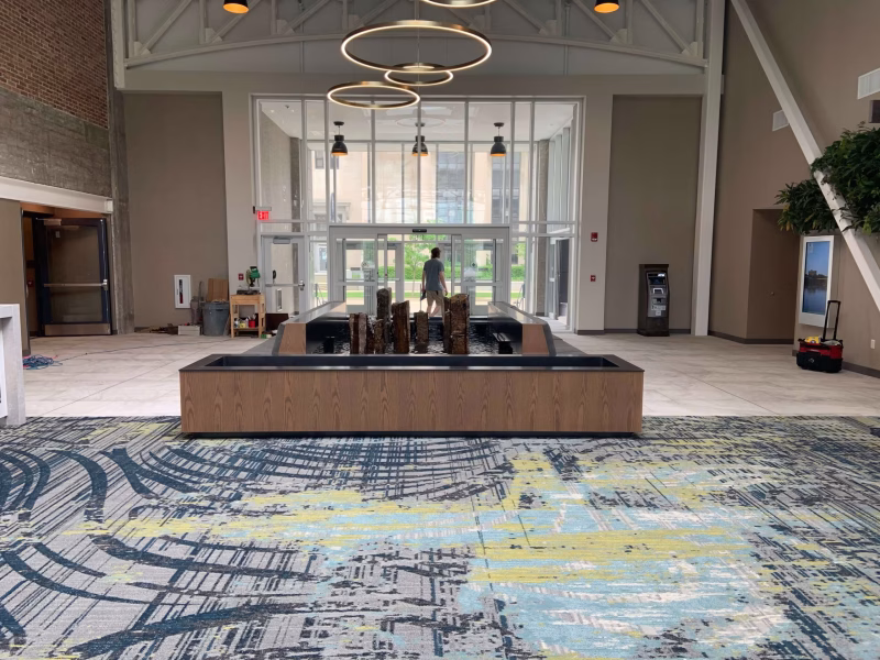 Reflection Pool with Stone Sculptures Overflowing at Embassy Suites by Hilton Rockford, Illinois