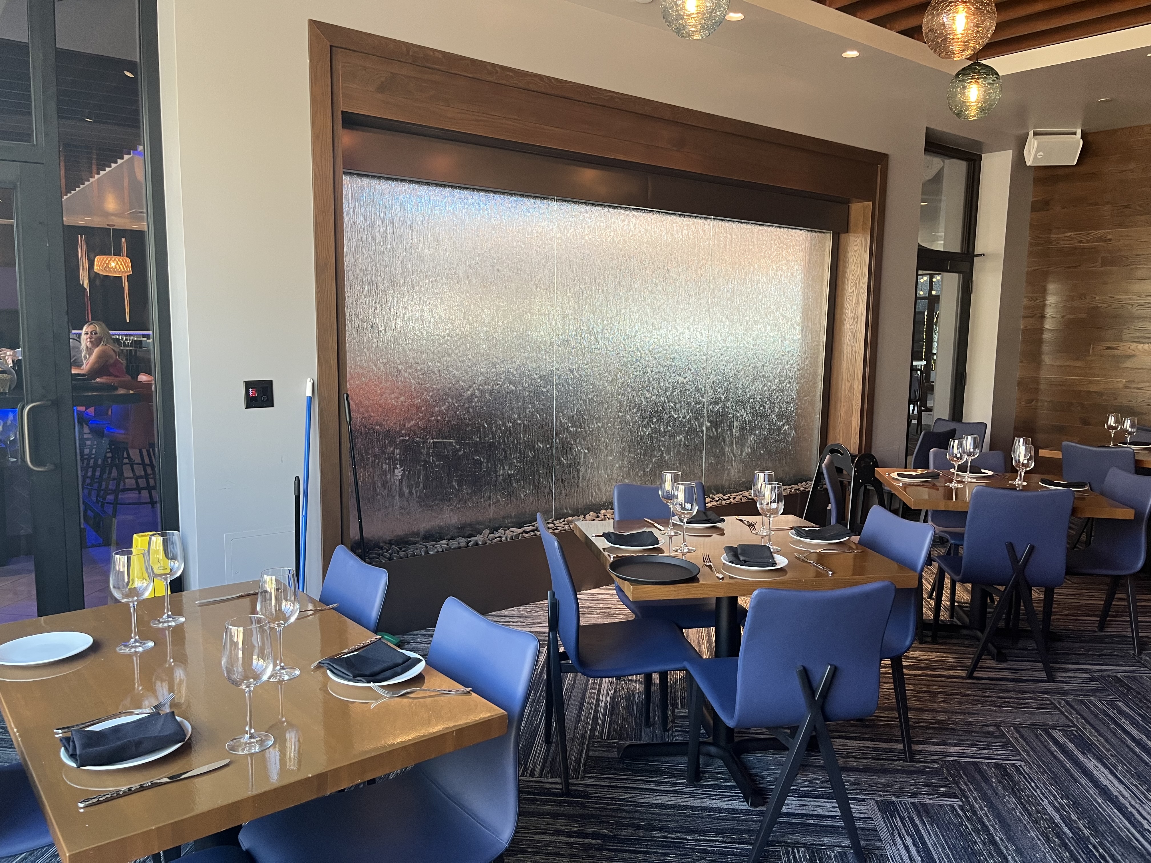 Textured Glass Water Wall with Brown Powdercoated Stainless Steel Frame for Kona Grill Desert Ridge in Phoenix, Arizona
