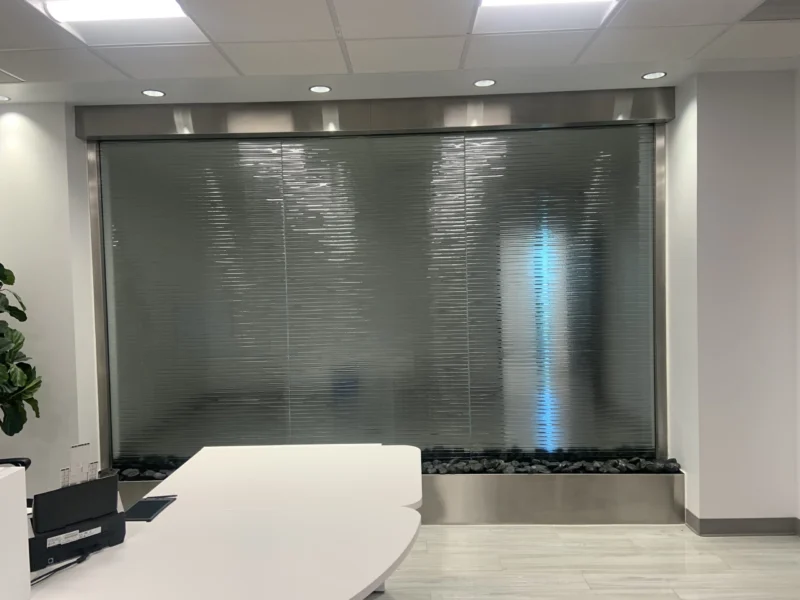 Textured Glass Water Wall with Stainless Steel Frame for Medical Office in Salt Lake City, Utah