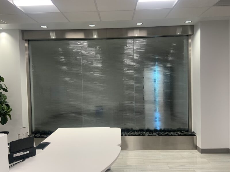 Textured Glass Water Wall with Stainless Steel Frame for Medical Office in Salt Lake City, Utah