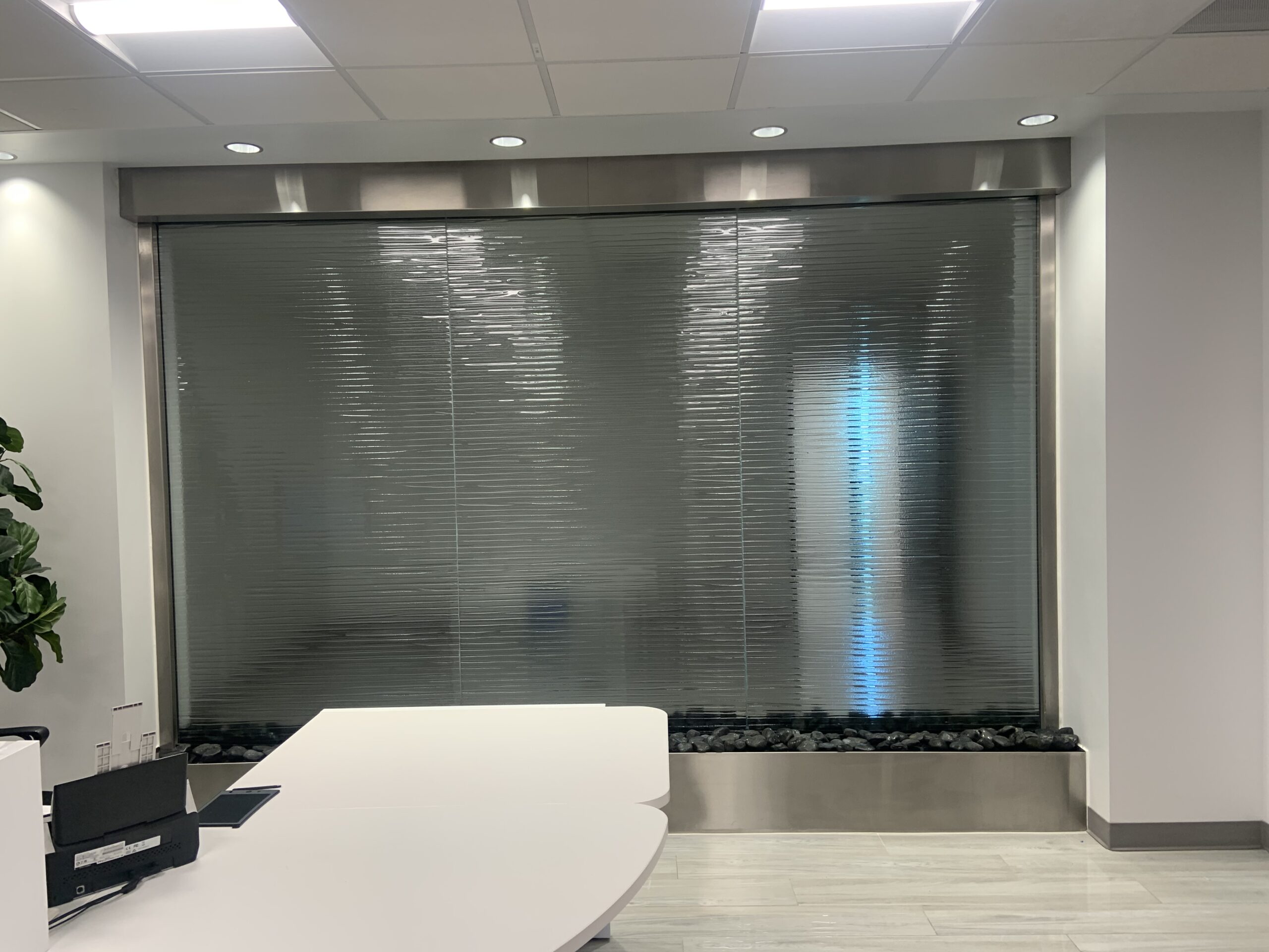 Textured Glass Water Wall with Stainless Steel Frame for Medical Office in Salt Lake City, Utah