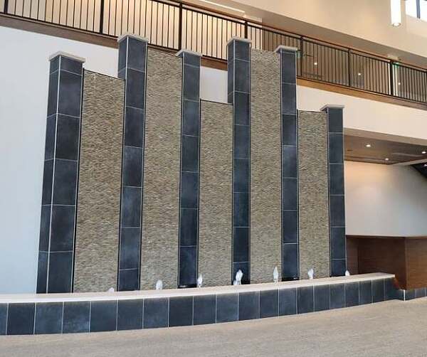 Tile Water Walls with Reflection Pool and Bubbler Jets for Hudsonville Ice Cream Headquarters in Holland, Michigan