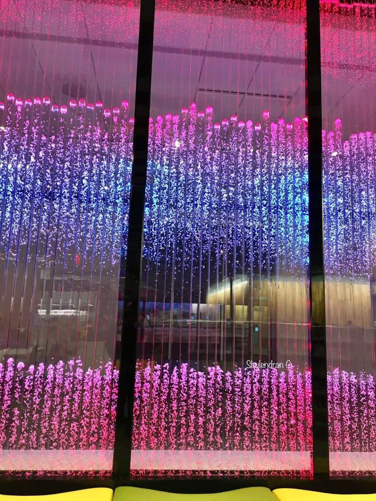 Vertical Chamber Bubble Wall with DMX Lighting at Olathe Public Library Vertical Chamber Bubble Wall with DMX Lighting at Olathe Public Library