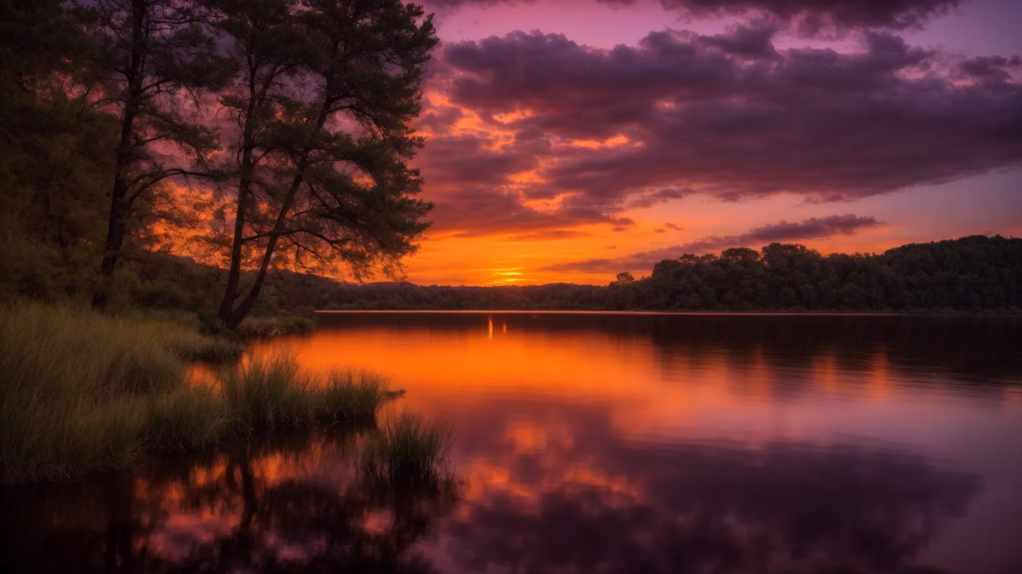 Transform Your Space With a Fountain Screen Design 6 a breathtaking sunset casts a warm golden glow over a serene lake, with vibrant reflections dancing on its surface beneath a sky painted in hues of orange and purple.