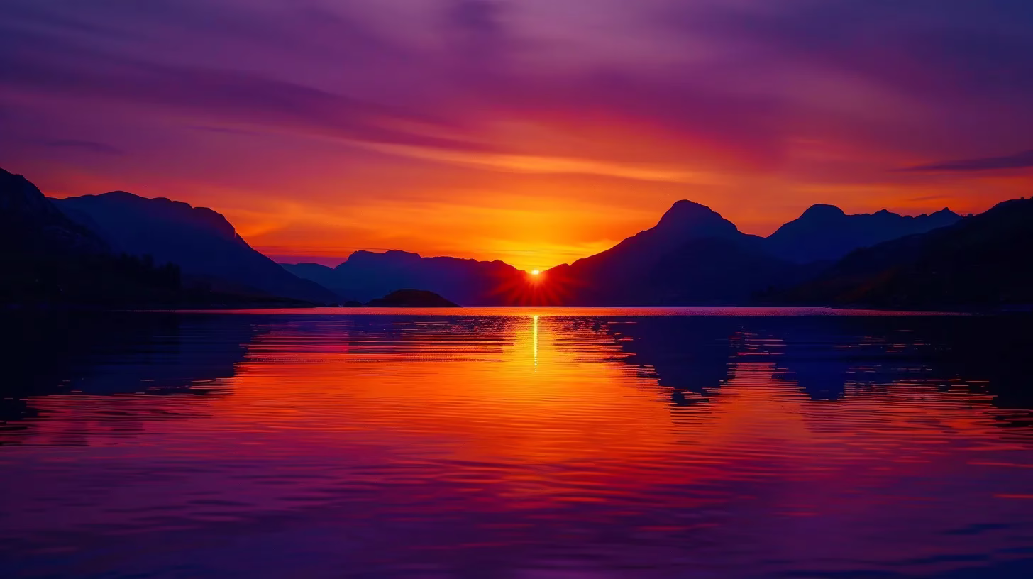 a breathtaking sunset casts vibrant hues of orange and purple over a tranquil lake, surrounded by silhouetted mountains reflecting the serene beauty of nature.