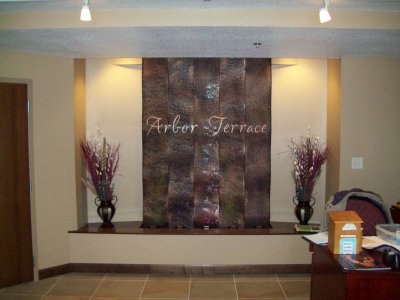 interior waterfall samaritan bethany senior living facility weaving wave waterfall rochester mn