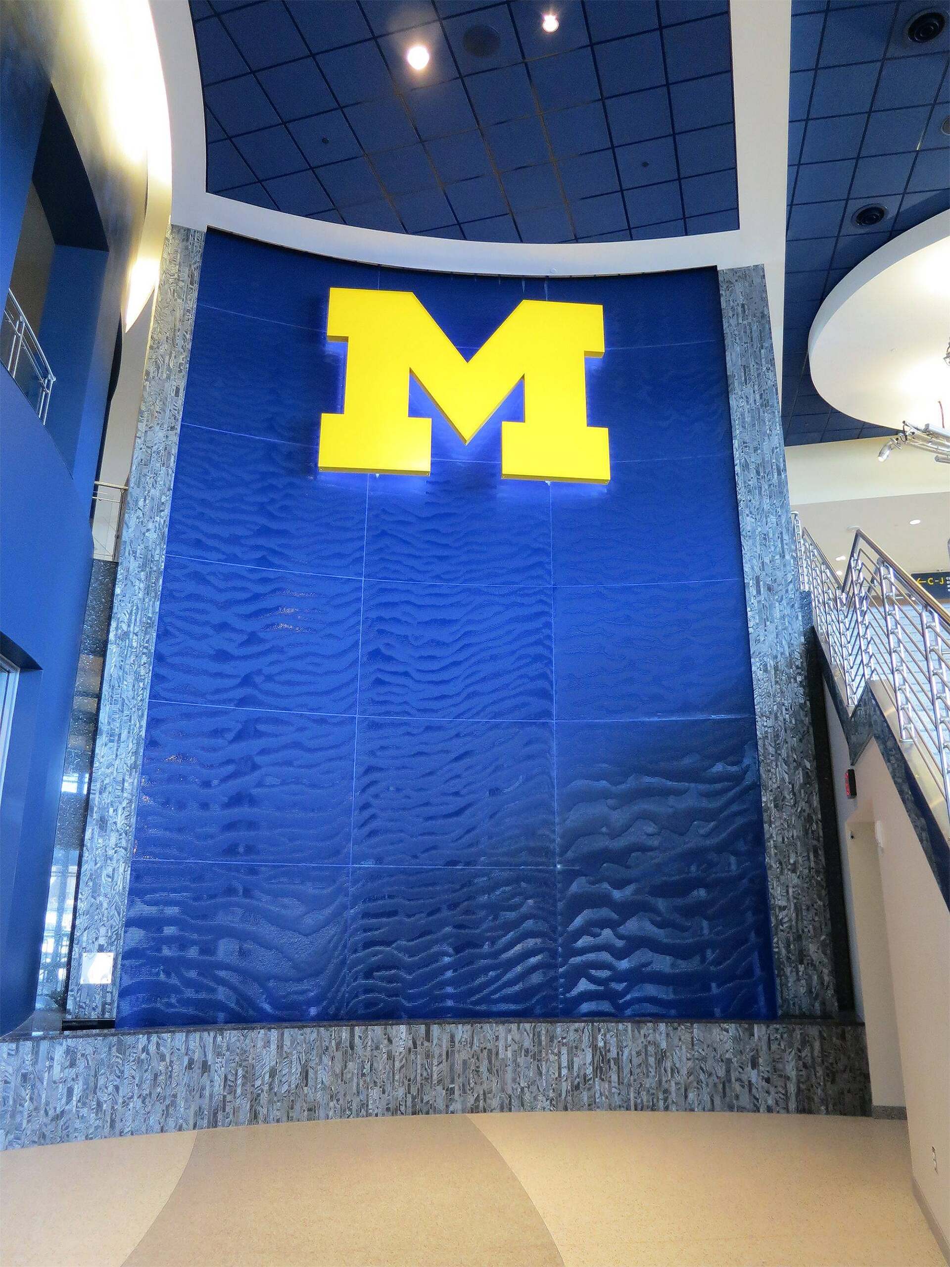 water wall university of michigan crisler center scored acrylic water wall 35ft video 1 scaled